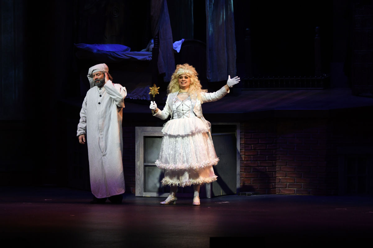 140 The Ghost of Christmas Present with Scrooge in A Christmas Carol.jpg